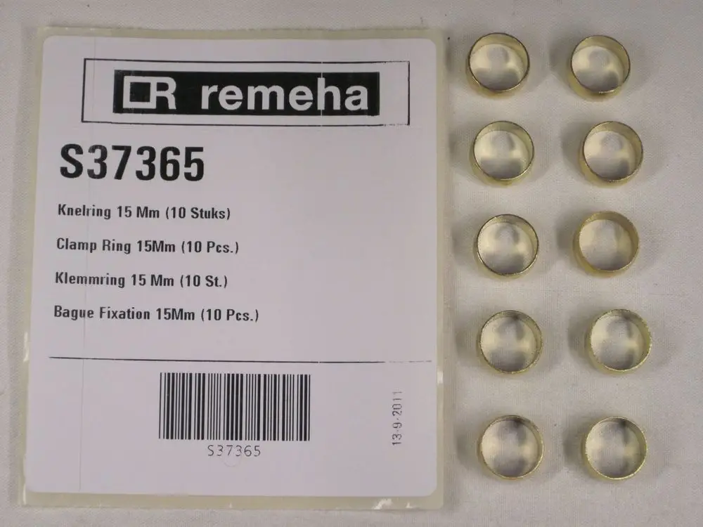 Goldfarbene Ringe auf einer Verpackung mit der Marke Remeha. Zehn Ringe sind sichtbar. Verpackung zeigt Artikelinformationen und Barcode.